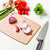 Kitchen Series Cutting Board in Natural with a Victorinox Chef's Knife