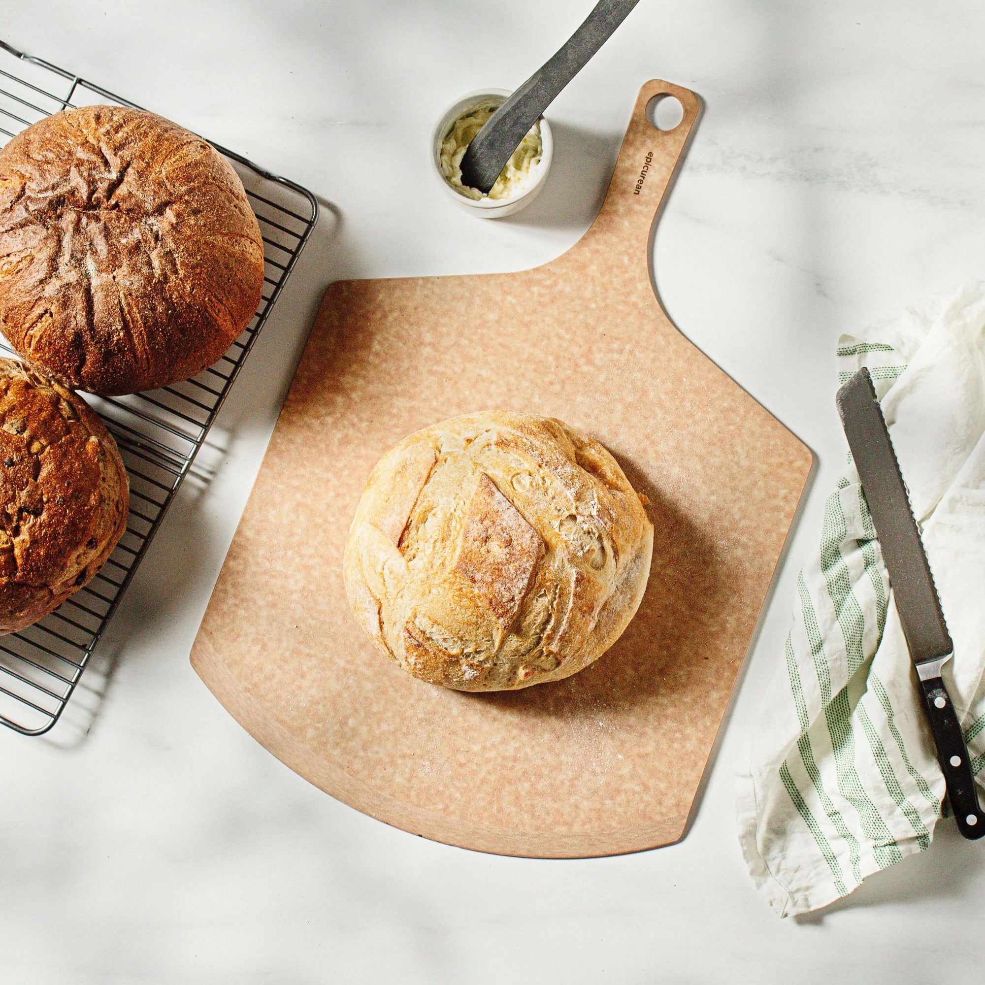 Epicurean Pizza Peel Plus in Natural with sour dough bread