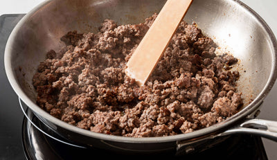Epicurean Cool Tool in Natural being use to sauté some ground beef