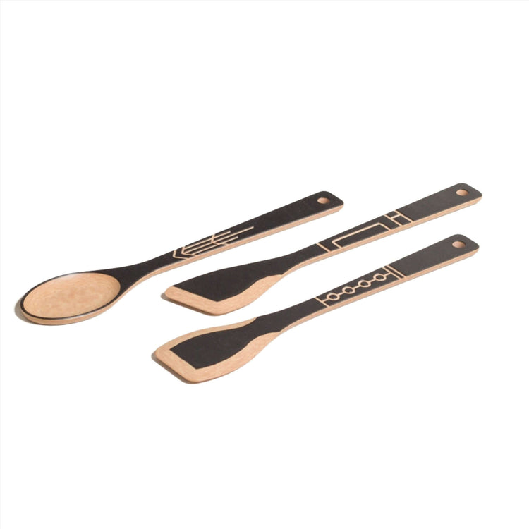The Frank Lloyd Wright Utensil Set includes the Large Spoon, Paddle and Sauté Tool in Slate/Natural