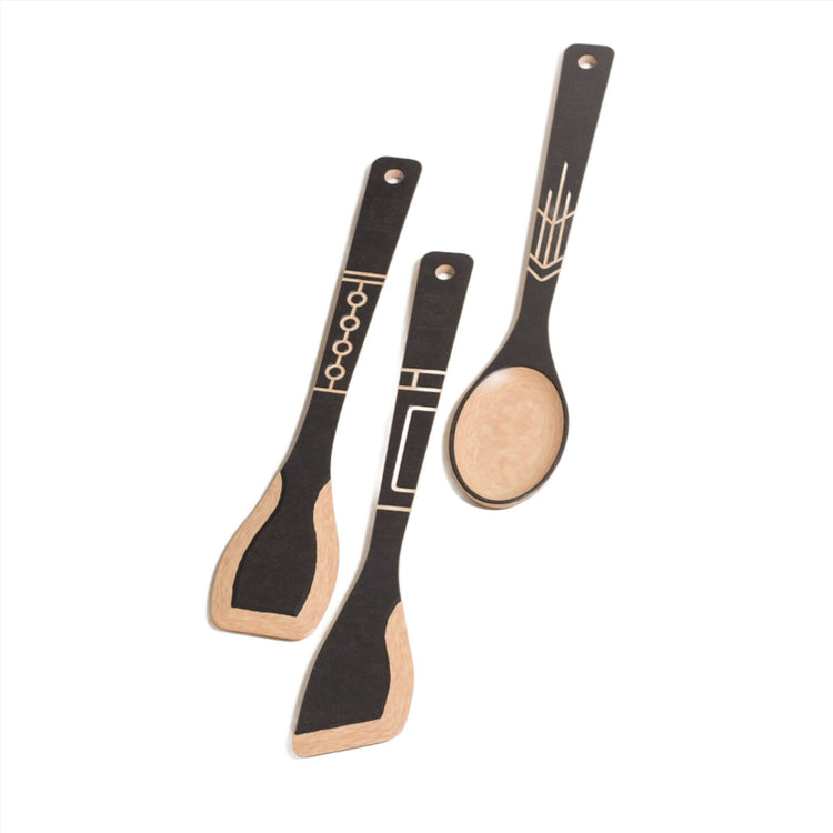 The Frank Lloyd Wright Utensil Set includes the Large Spoon, Paddle and Sauté Tool in Slate/Natural