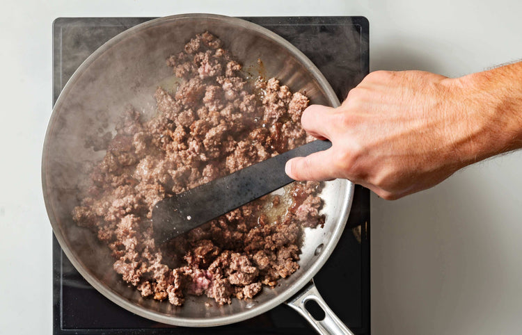 Epicurean Cool Tool in Slate being use to sauté some ground beef