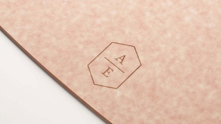 A custom monogram design showcasing A over E in an elegant hexagonal frame