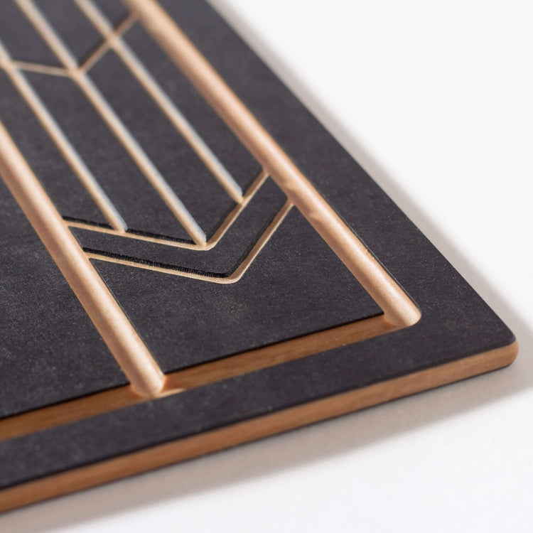 The Frank Lloyd Wright Cut & Serve Collection Boards in Medium in Slate/Natural close up detail