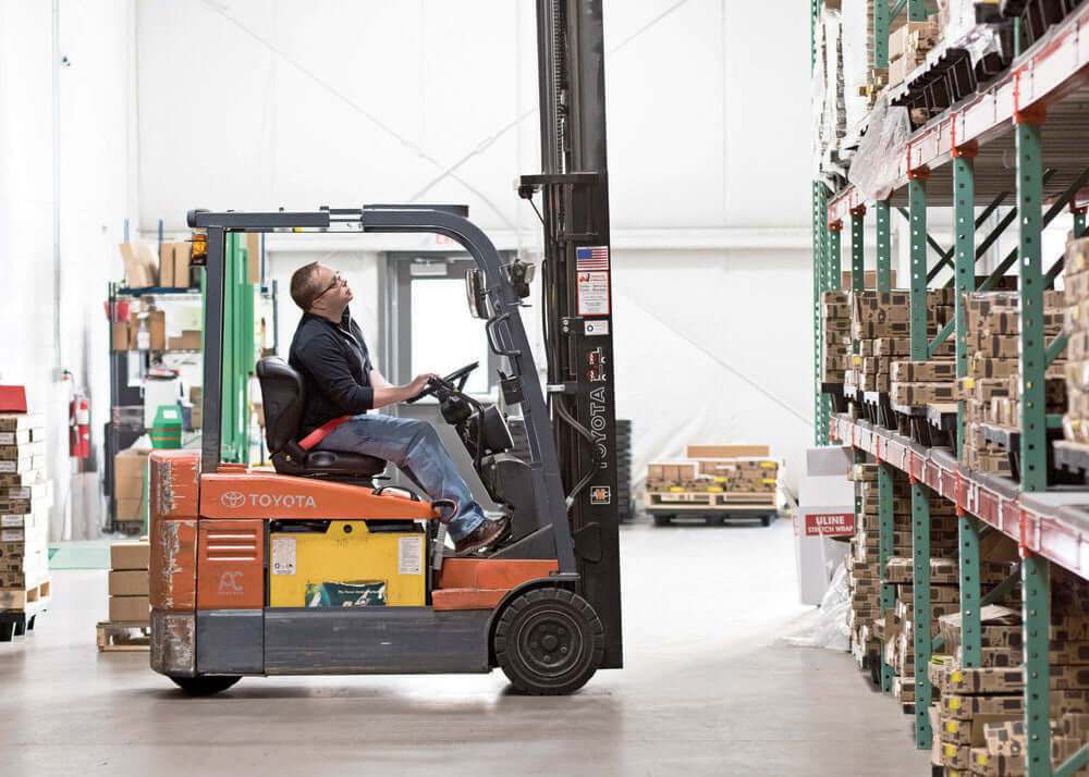 Epicurean Forklift in use in the Warehouse