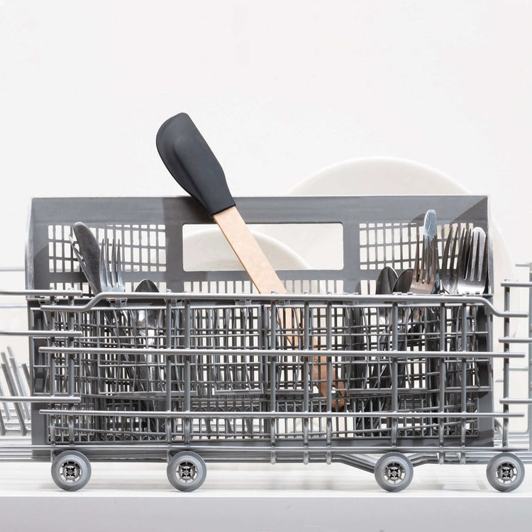 Epicurean Silicone Series Natural/Black Small Spatula sitting in a dishwasher silverware basket