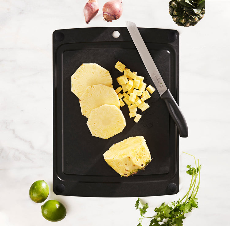All-in-One Slate Cutting Board With Sliced Pineapple and Victorinox Knife