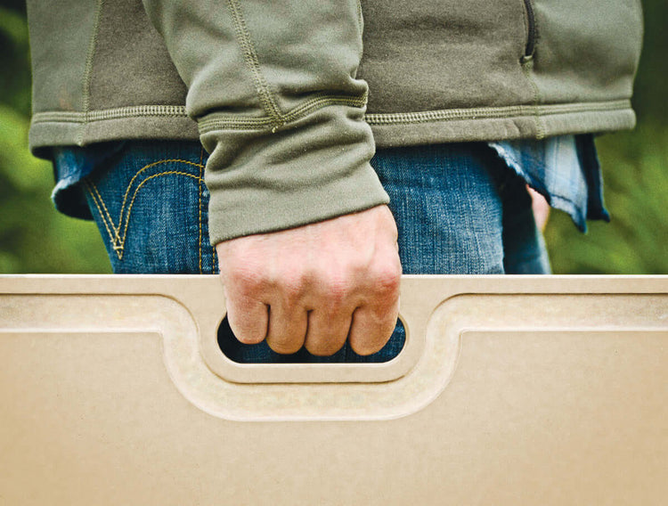Big Game Cutting Board Being Held By Handle