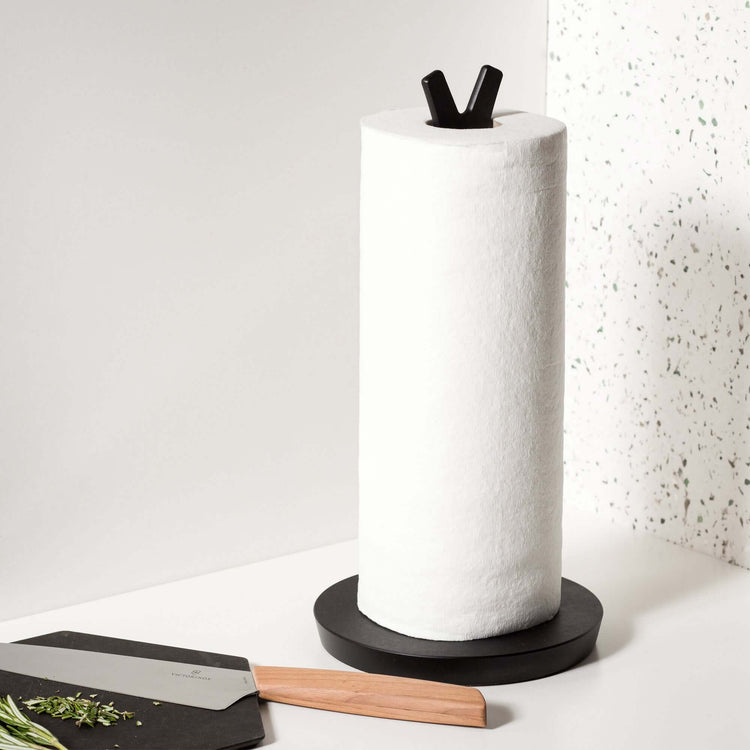 Epicurean Paper Towel Holder in Slate on a counter top with a full roll of paper towels